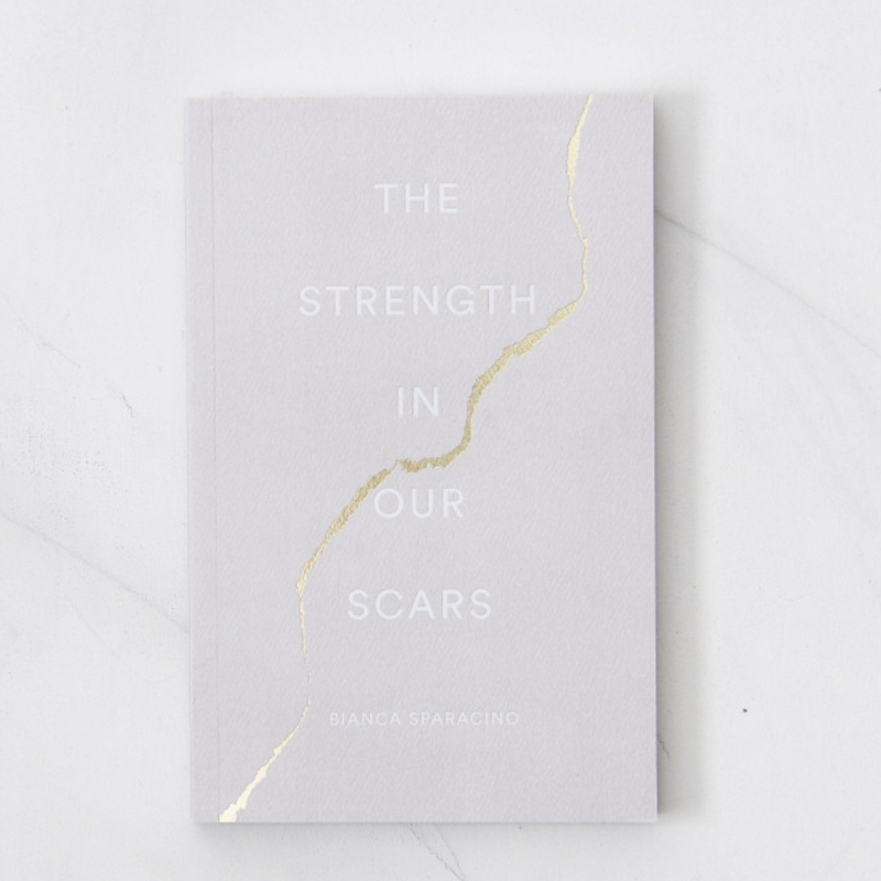 The Strength In Our Scars - Bianca Sparacino - The Self-Care Shop womens empowerment  self care  self-discovery  self-help books  mindset  mindfulness  mental health  meditation  manifesting  manifest  life purpose  healthy mindset  healing after breakups  heal  healing  empowerment  empowering  thought catalog books